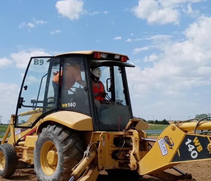 Worker in heavy machinery